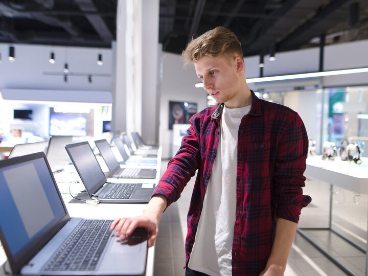 A person looking at computers
